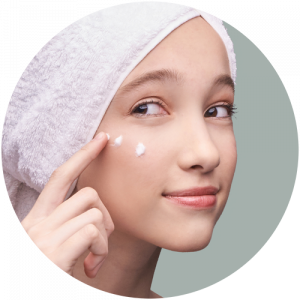 A woman with a cosmetic cream in the face